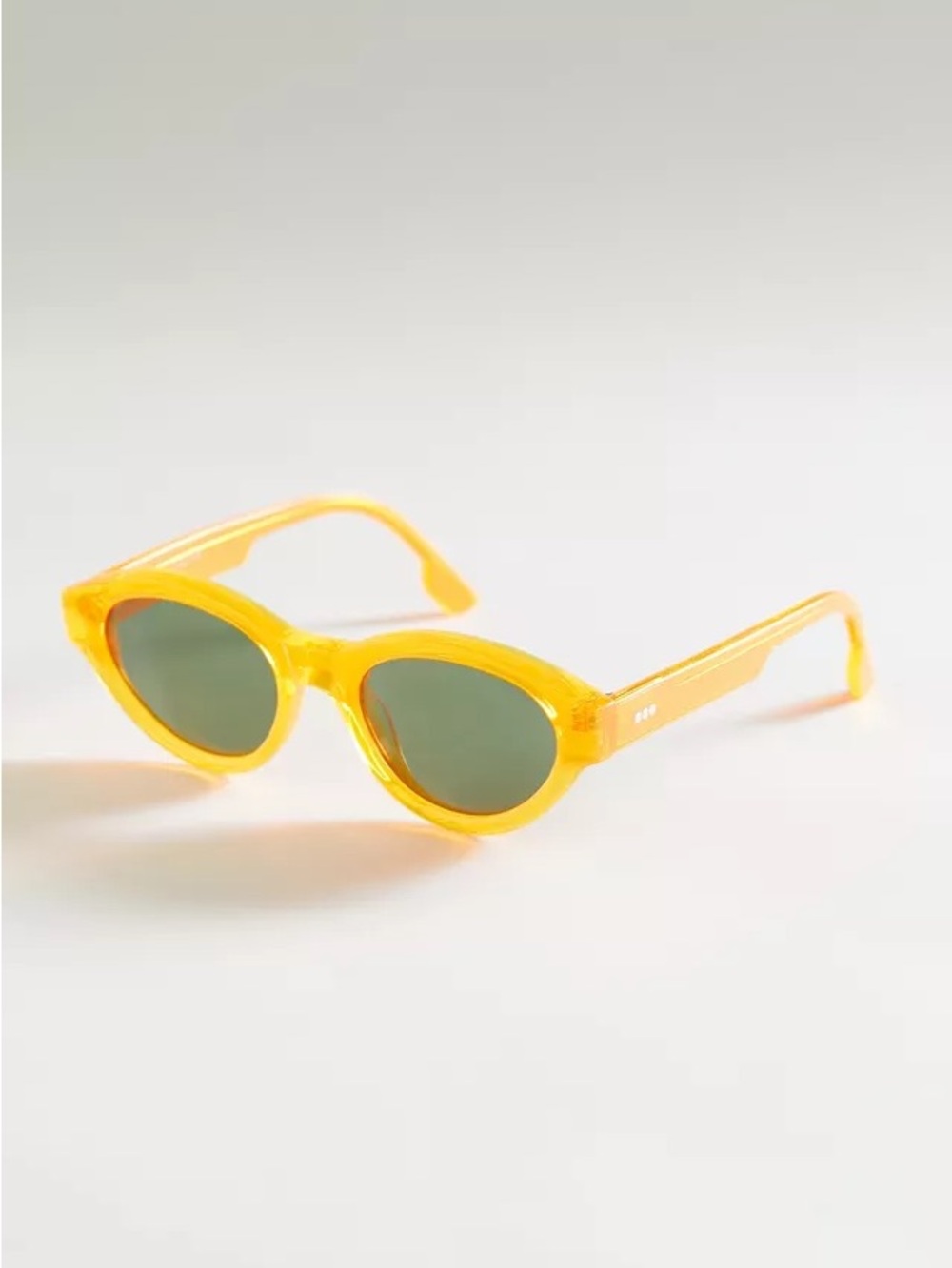 Komodo Kiki orange oval sunglasses